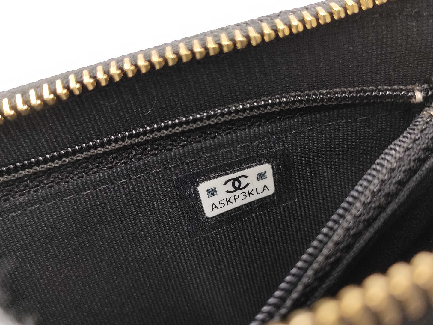 CHANEL CHANEL Multi-Pocket Clutch Bag in Black Caviar Skin with Seal