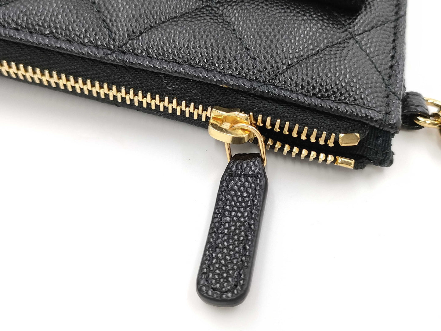 CHANEL CHANEL Multi-Pocket Clutch Bag in Black Caviar Skin with Seal