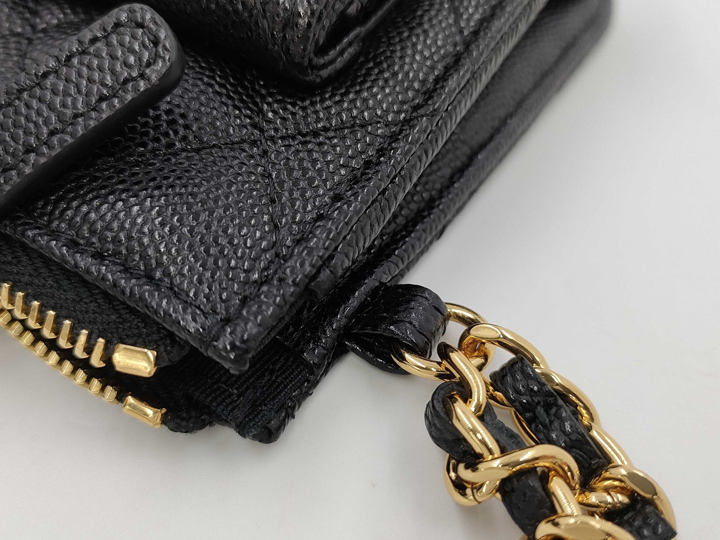 CHANEL CHANEL Multi-Pocket Clutch Bag in Black Caviar Skin with Seal