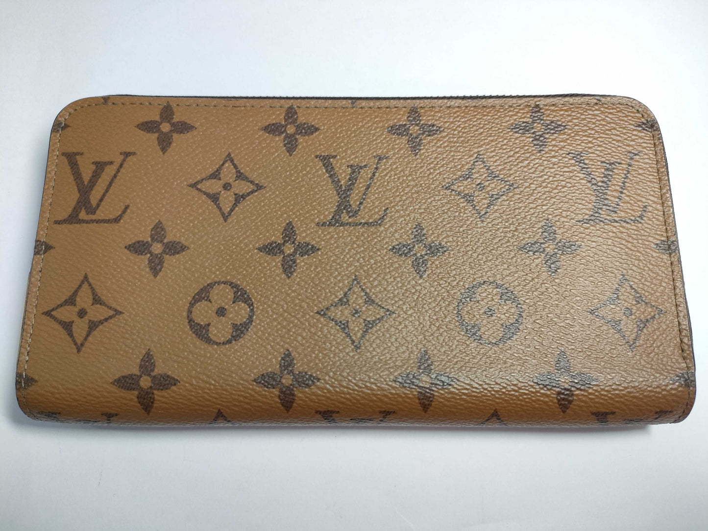 LOUIS VUITTON M82444 Louis Vuitton Monogram Reverse Zippy Wallet with IC Tag and G Hardware