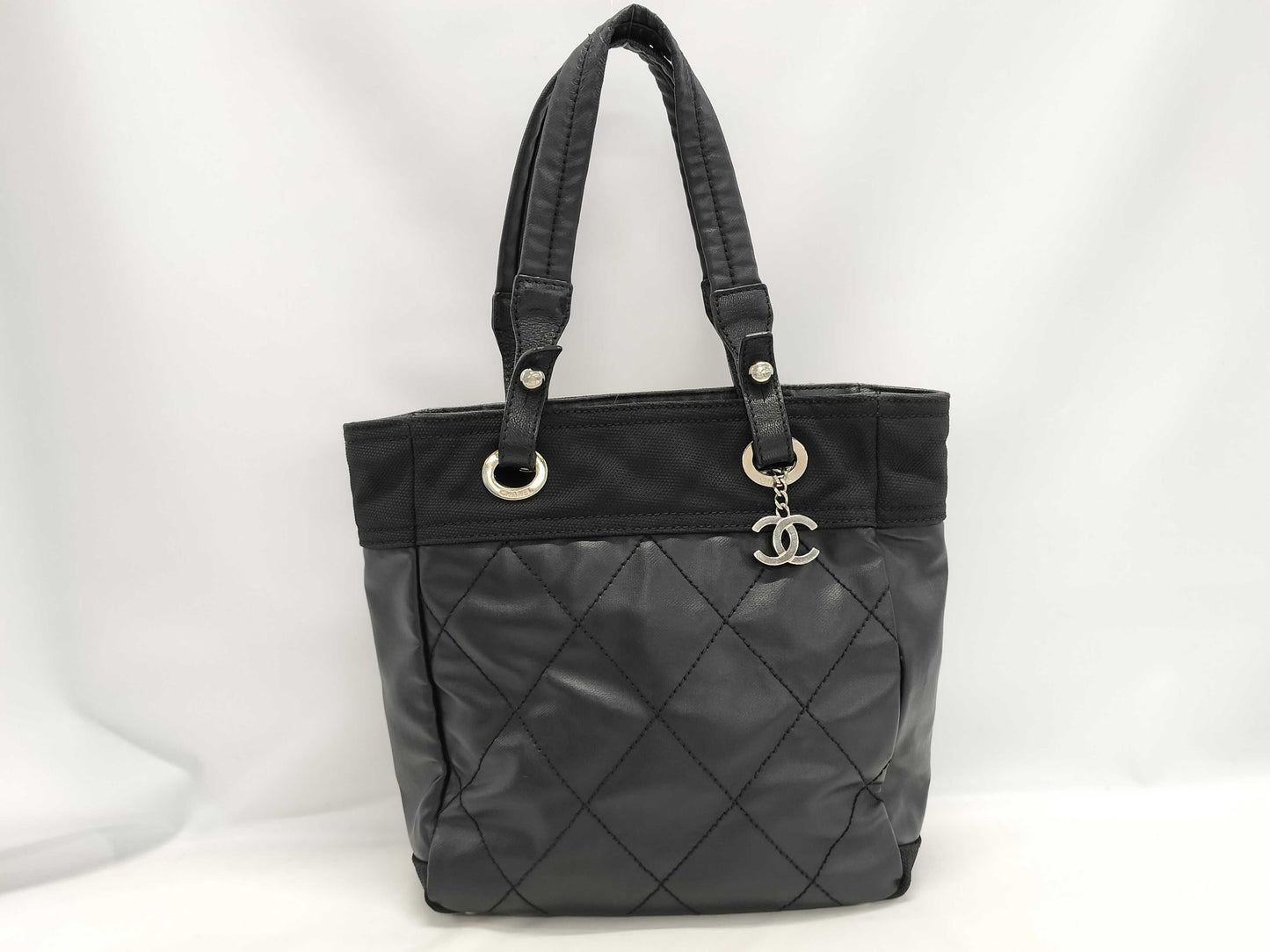 CHANEL Paris Biarritz Tote PM Coated Canvas Black with Silver Hardware A34208 Tote Bag