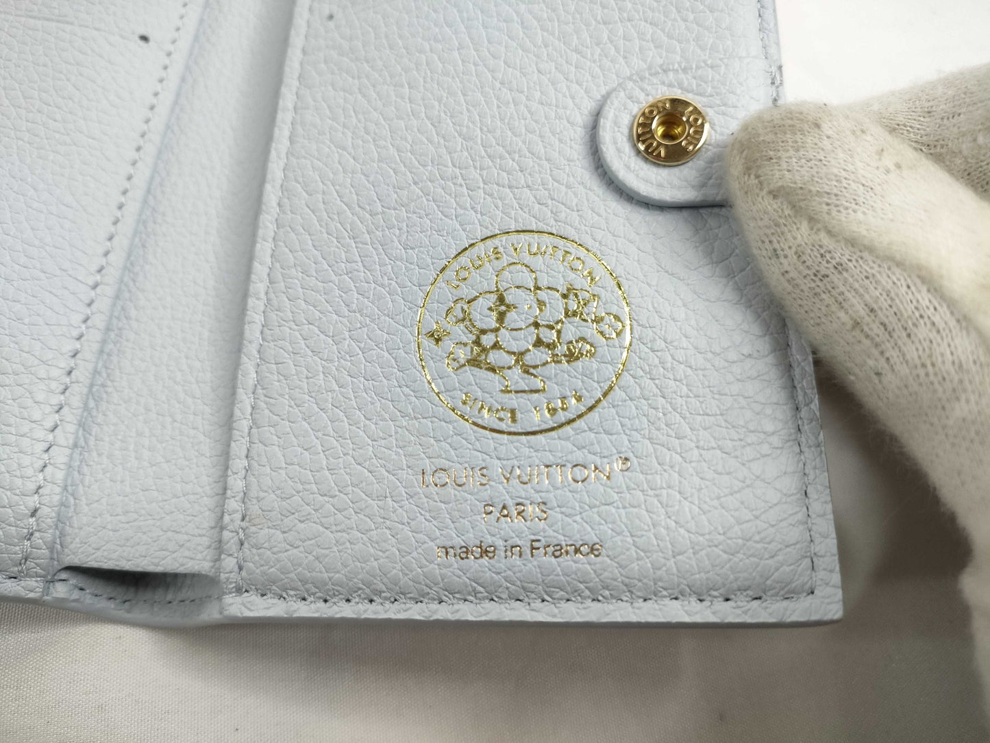 LOUIS VUITTON Brand new, unused Louis Vuitton Portefeuille Lisa in Azure Blue, Vivienne, with limited edition stamping, box, dust bag, wallet