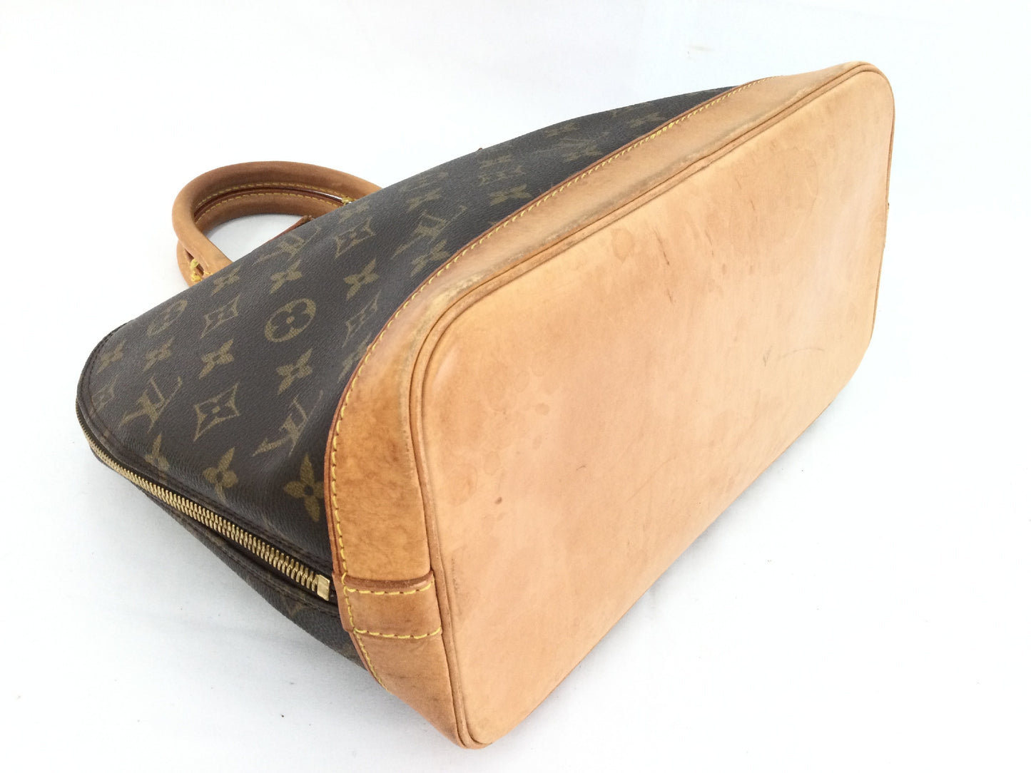 LOUIS VUITTON Monogram Alma Handbag