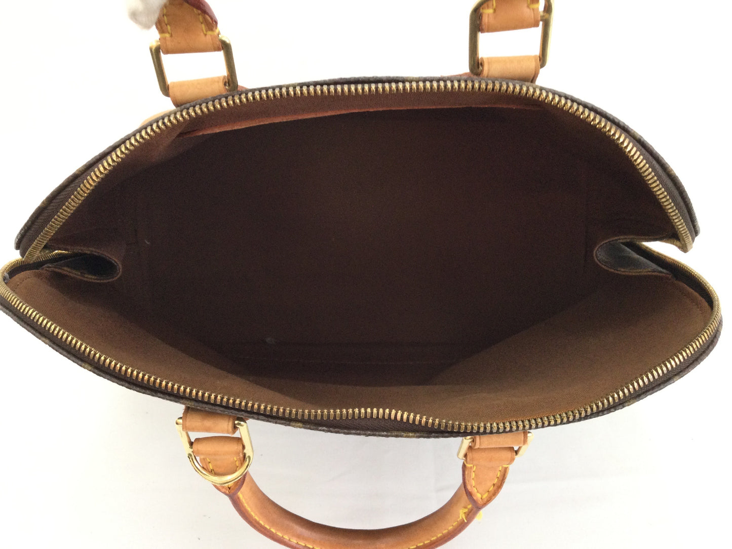 LOUIS VUITTON Monogram Alma Handbag