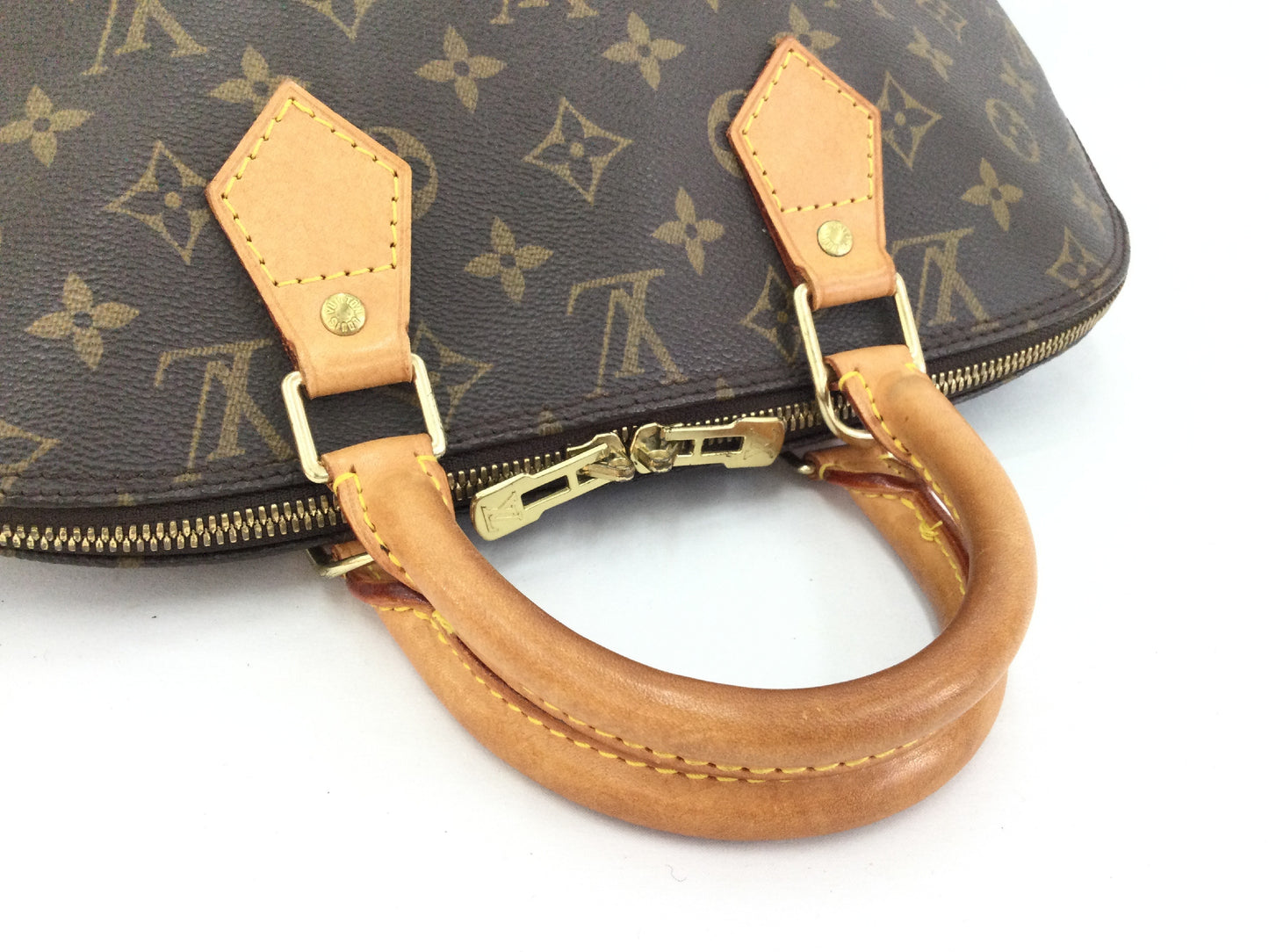 LOUIS VUITTON Monogram Alma Handbag