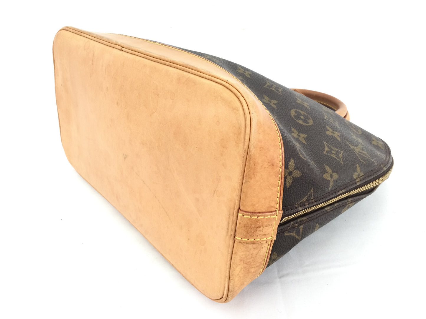LOUIS VUITTON Monogram Alma Handbag