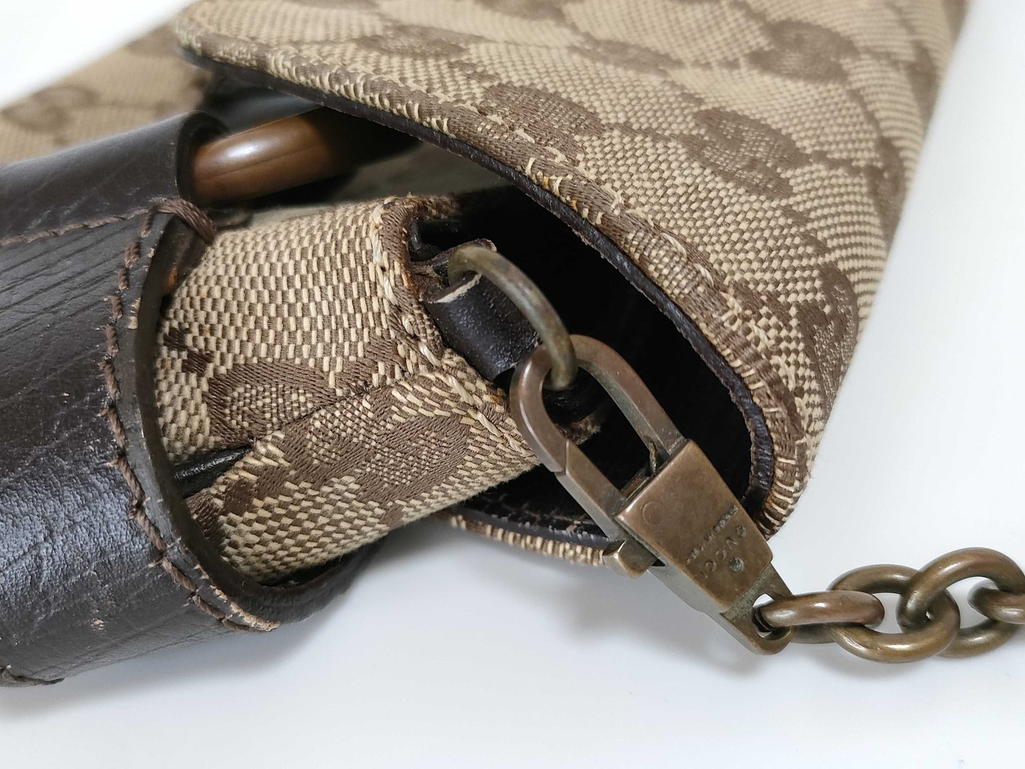 GUCCI GG Canvas Shoulder Bag with Horsebit Hardware and GG Pattern