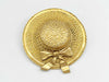 CHANEL straw hat brooch