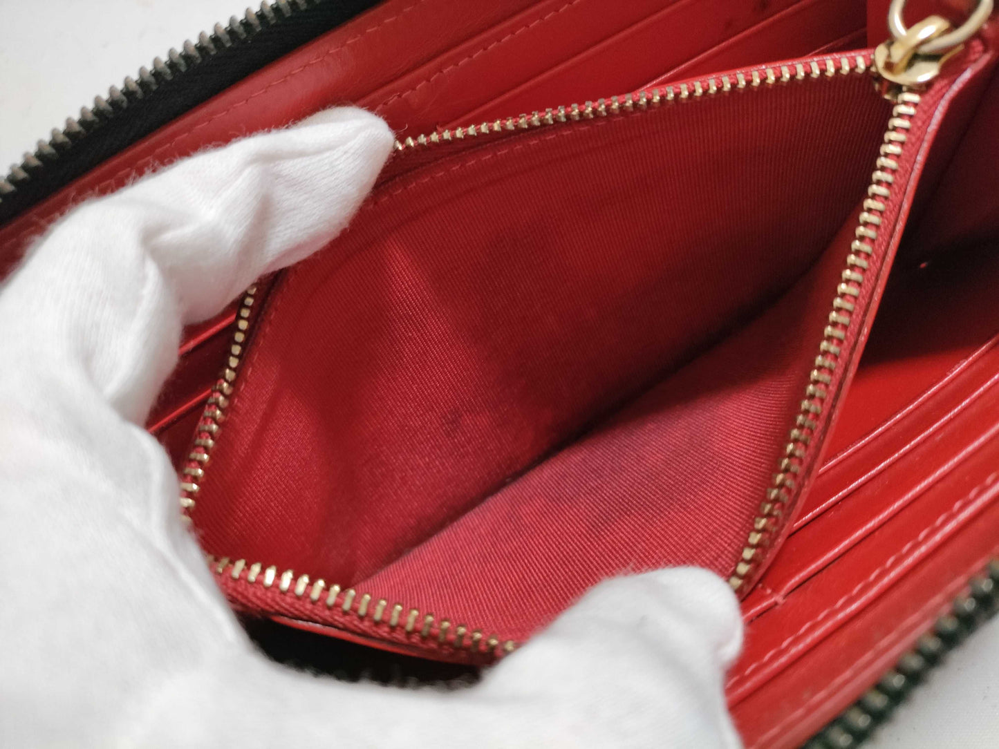 Christian Louboutin round zipper long wallet with dust bag