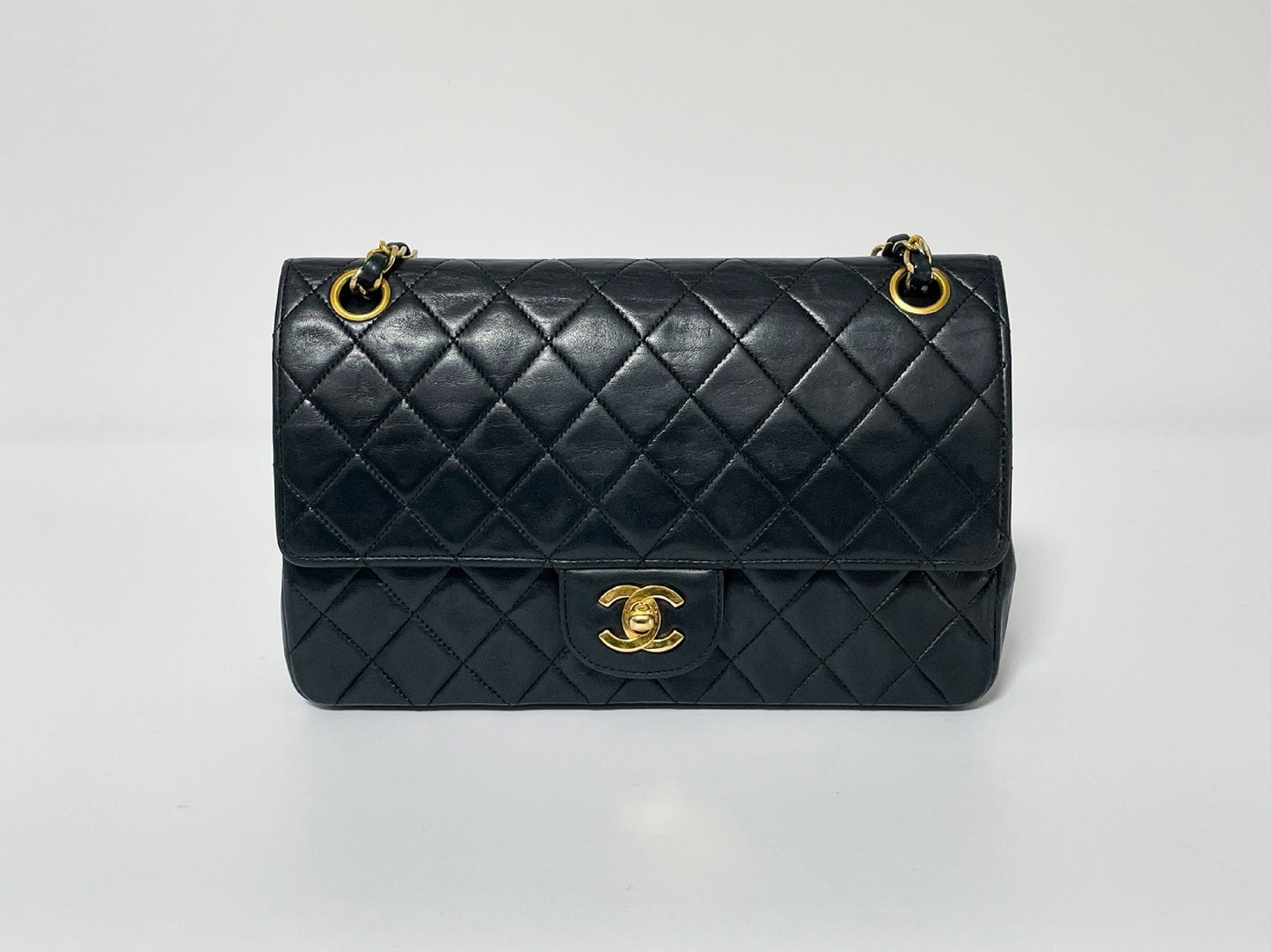 CHANEL Double Flap Matelasse Black Lambskin Shoulder Bag with Seal
