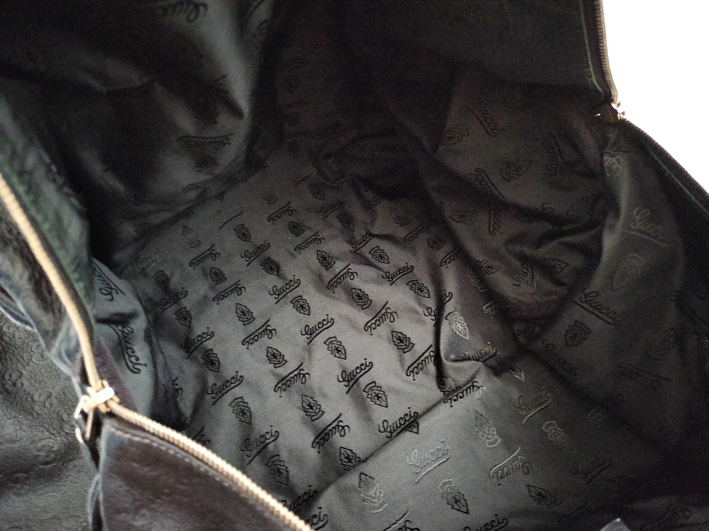 GUCCI Guccissima 2-way Boston bag with GG pattern and 206500 leather.