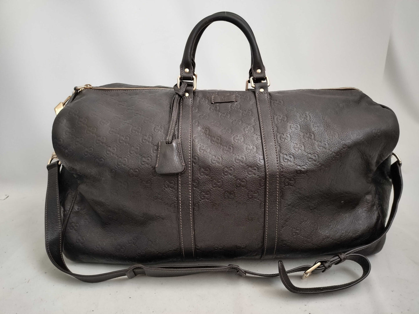 GUCCI Guccissima 2-way Boston bag with GG pattern and 206500 leather.