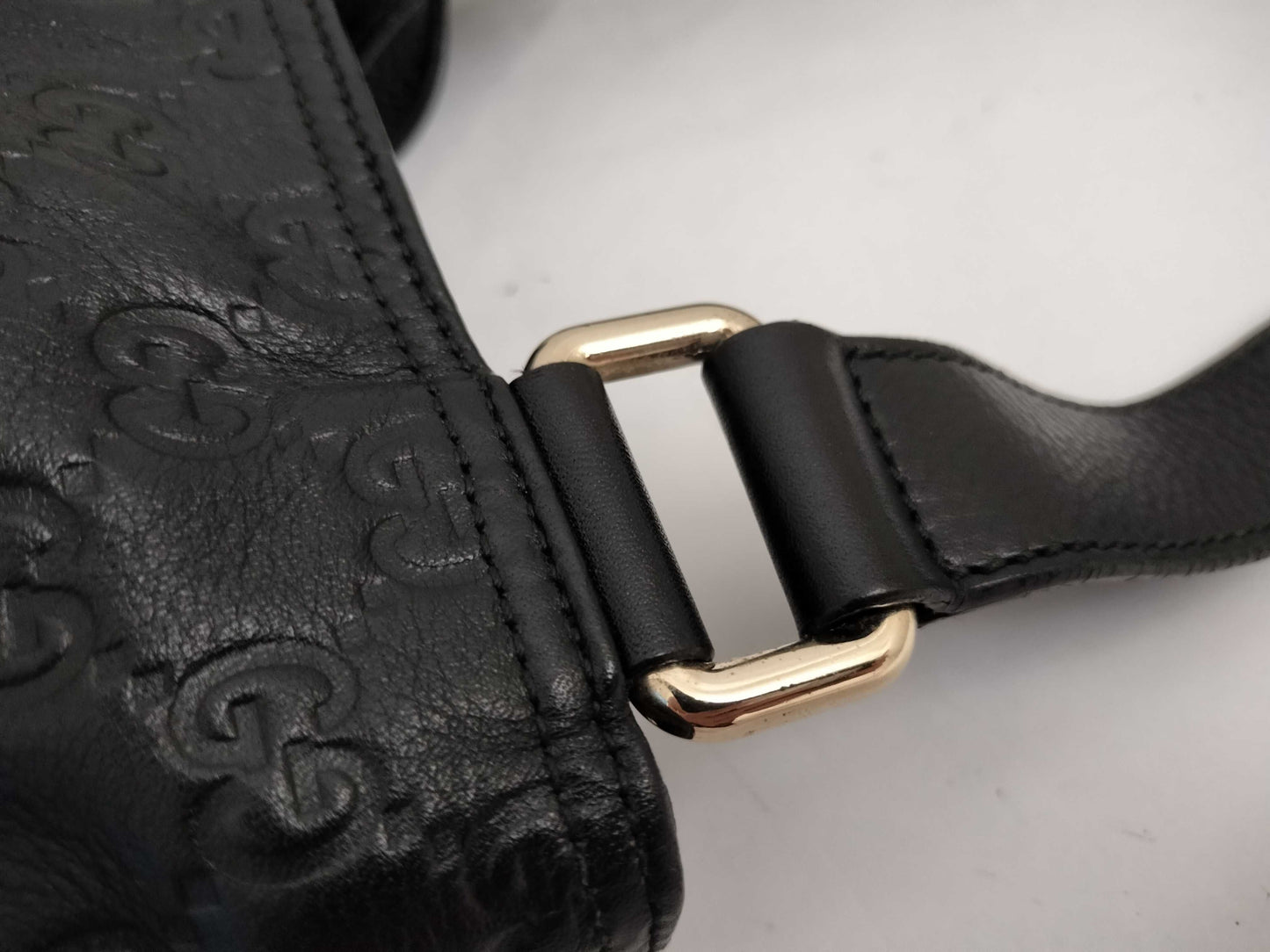 GUCCI Guccissima Leather Shoulder Bag with GG Pattern and Logo Plate 201446