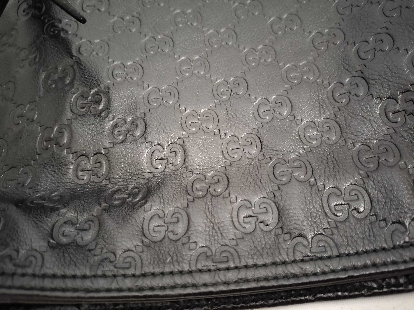 GUCCI Guccissima Leather Shoulder Bag with GG Pattern and Logo Plate 201446