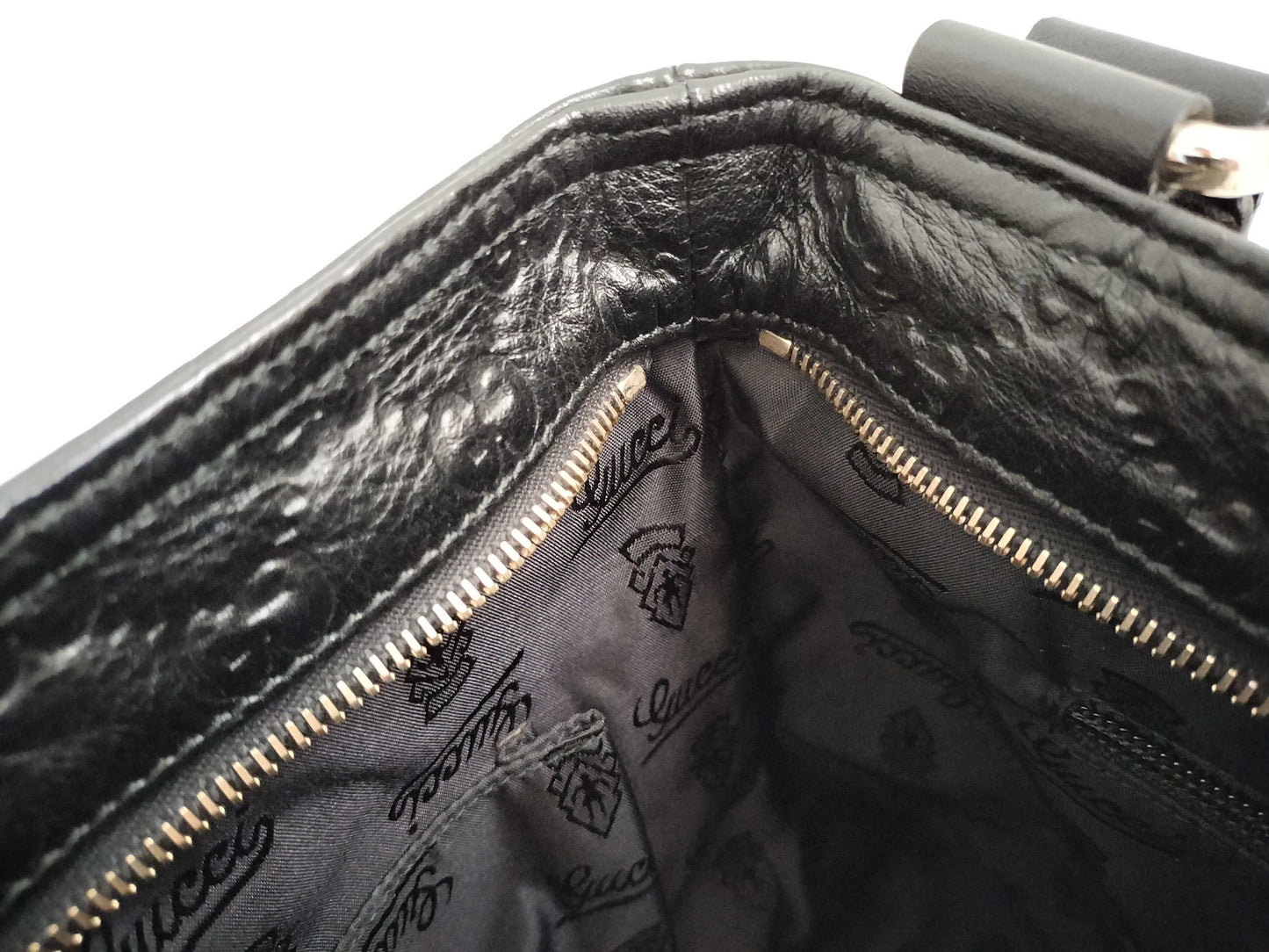 GUCCI Guccissima Leather Shoulder Bag with GG Pattern and Logo Plate 201446