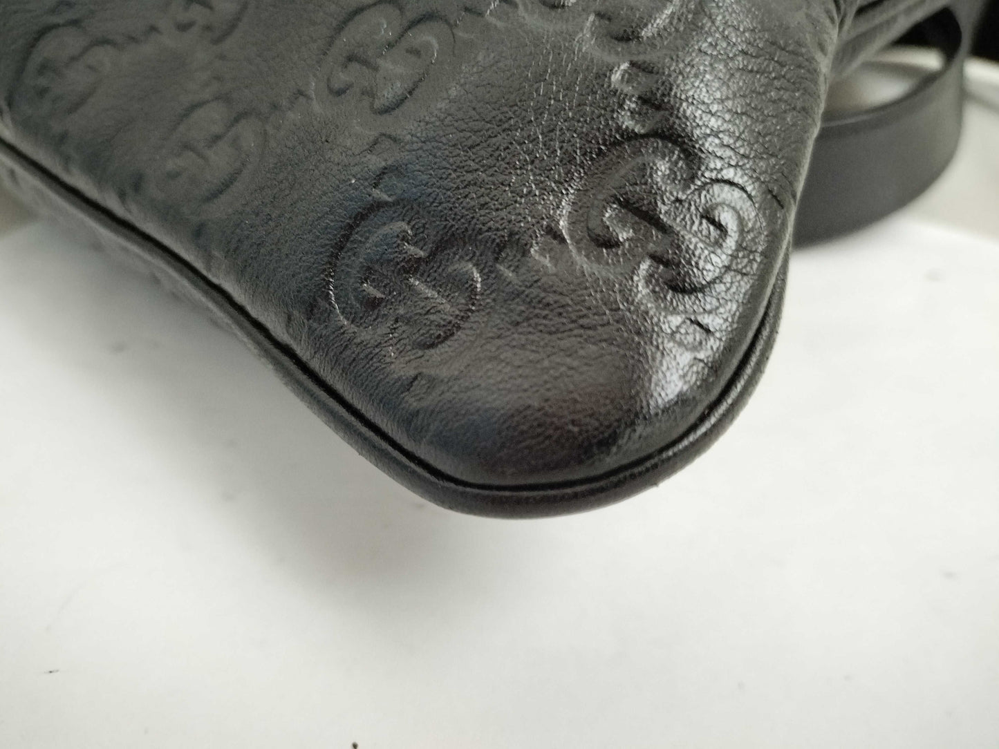 GUCCI Guccissima Leather Shoulder Bag with GG Pattern and Logo Plate 201446