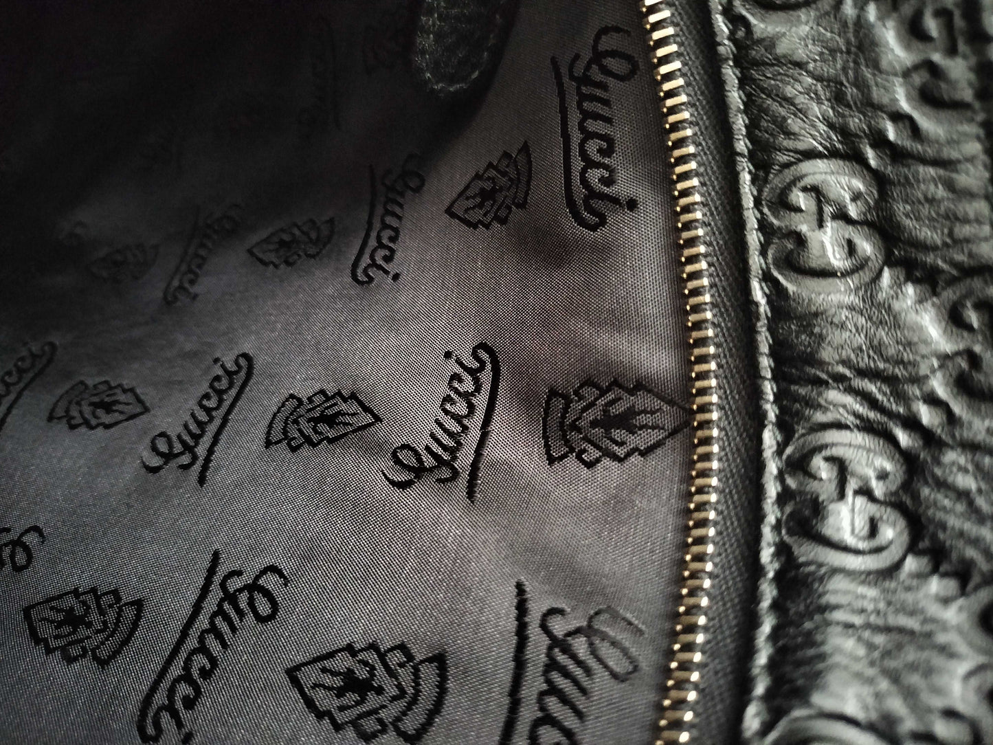 GUCCI Guccissima Leather Shoulder Bag with GG Pattern and Logo Plate 201446