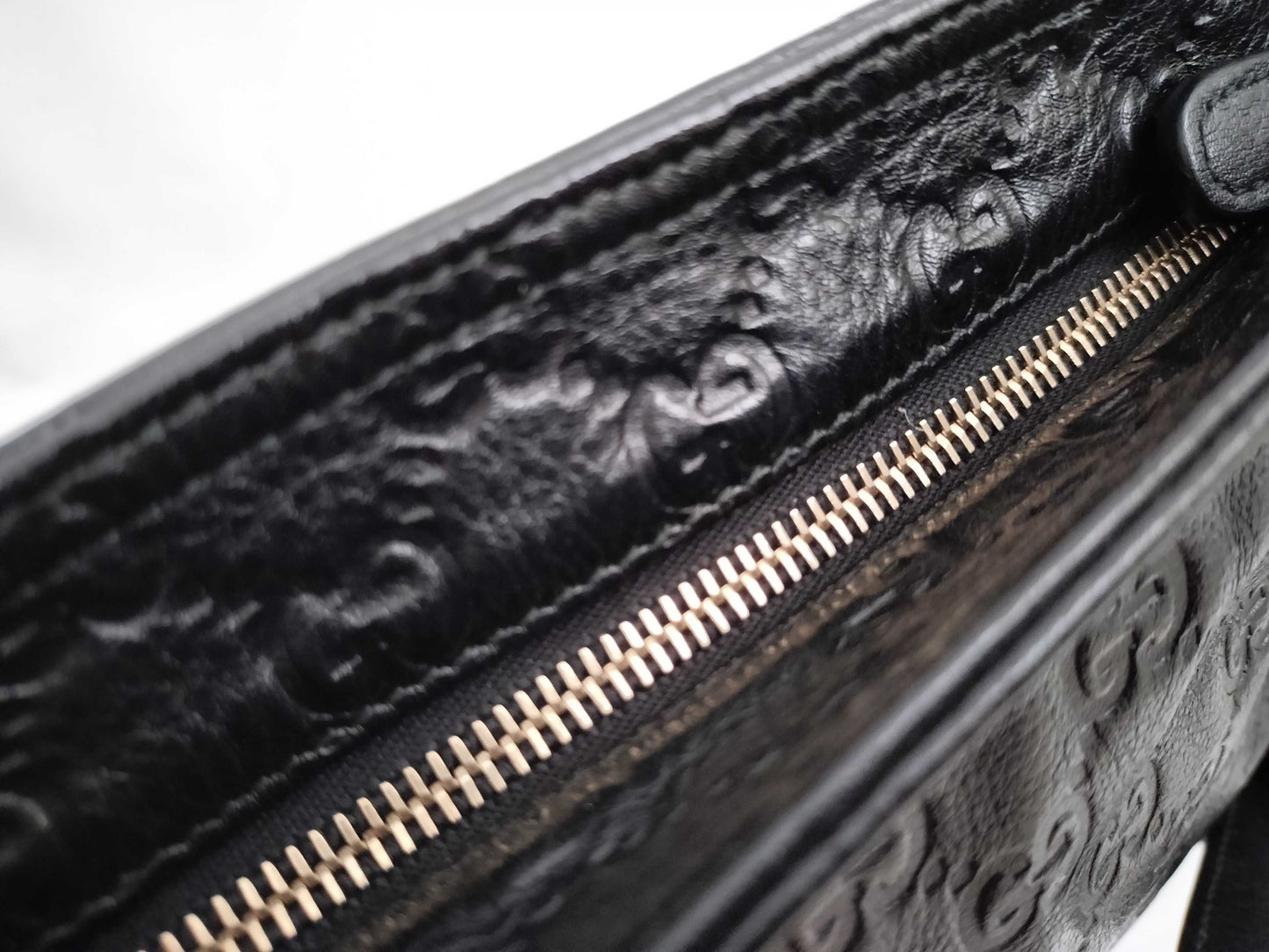 GUCCI Guccissima Leather Shoulder Bag with GG Pattern and Logo Plate 201446