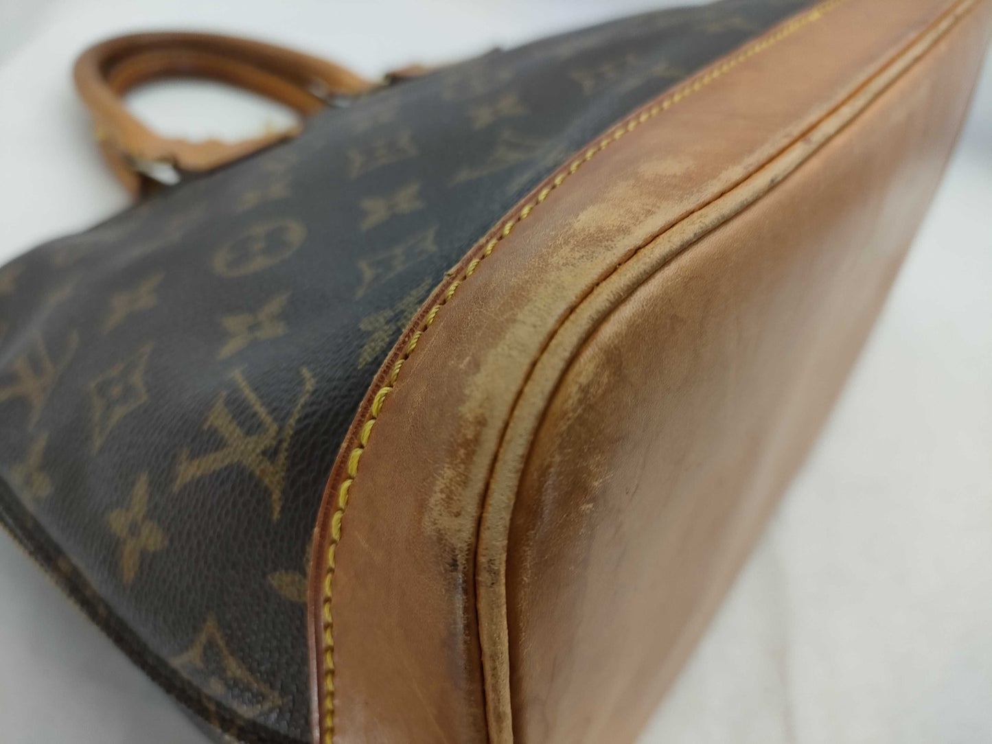 LOUIS VUITTON Monogram Alma GM Handbag