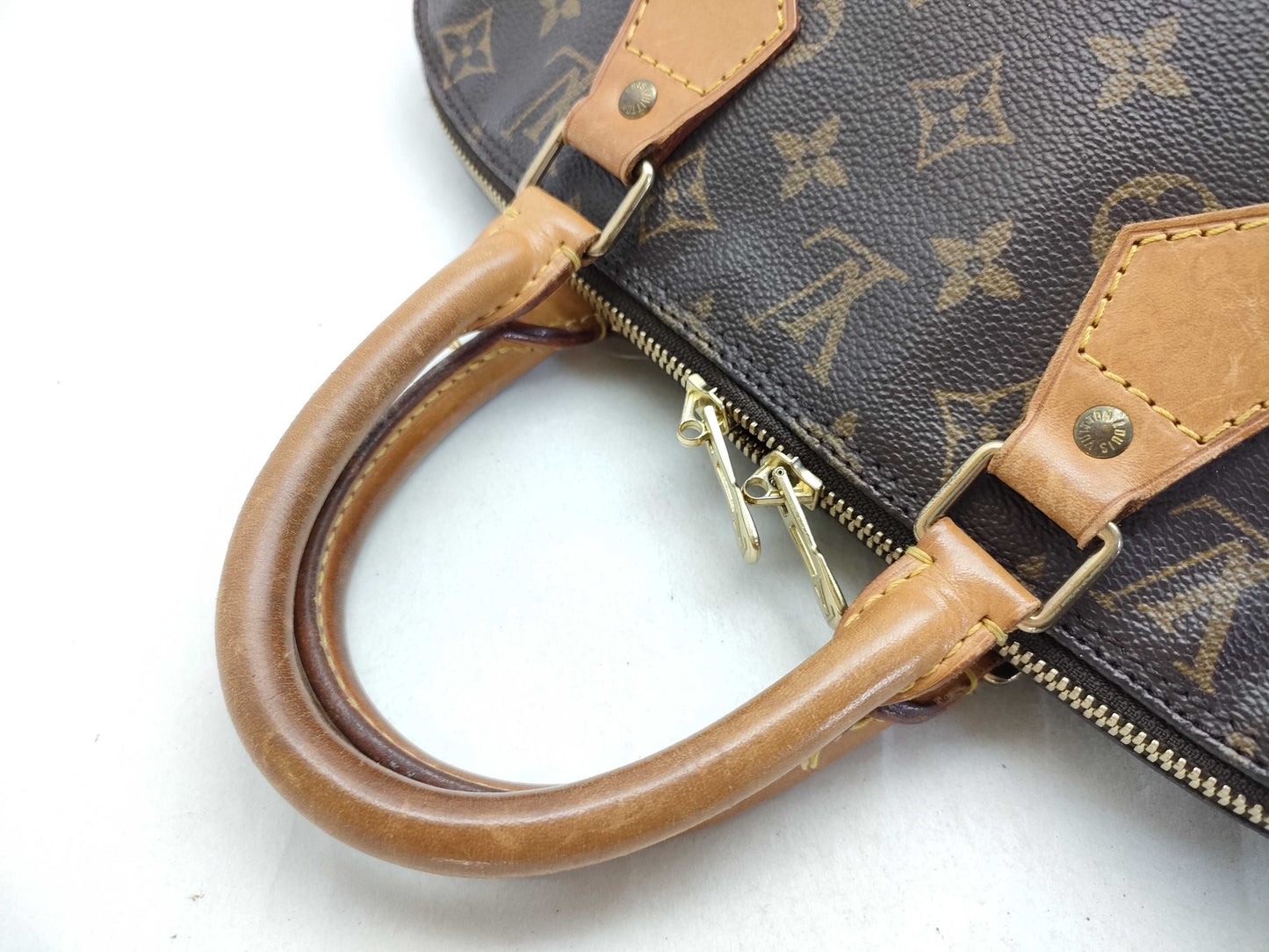 LOUIS VUITTON Monogram Alma GM Handbag