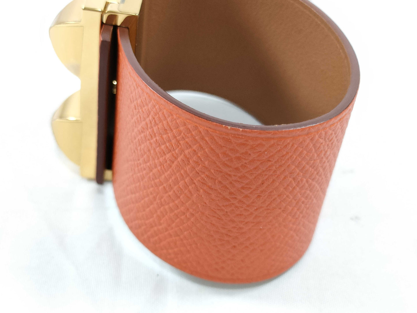 HERMES engraved X Hermes Medor X engraved PM bracelet with metal film.
