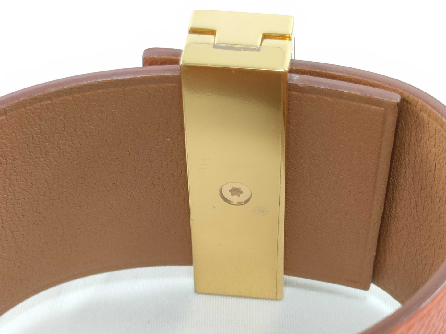 HERMES engraved X Hermes Medor X engraved PM bracelet with metal film.