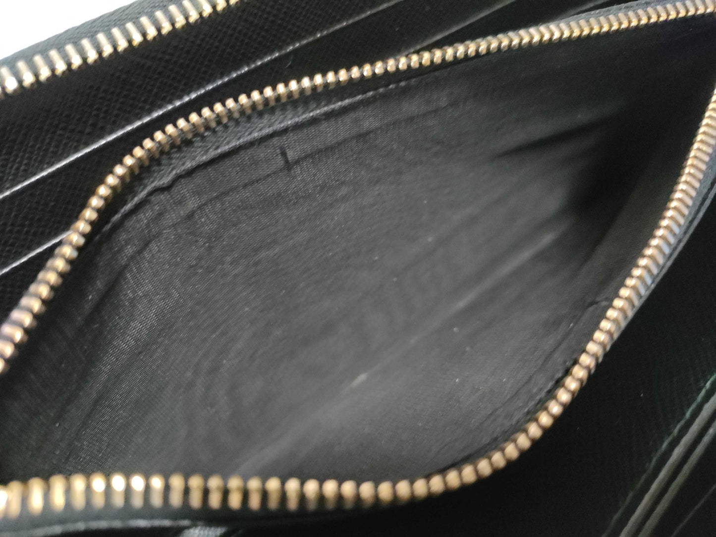 PRADA Saffiano Round Zippy Logo Wallet