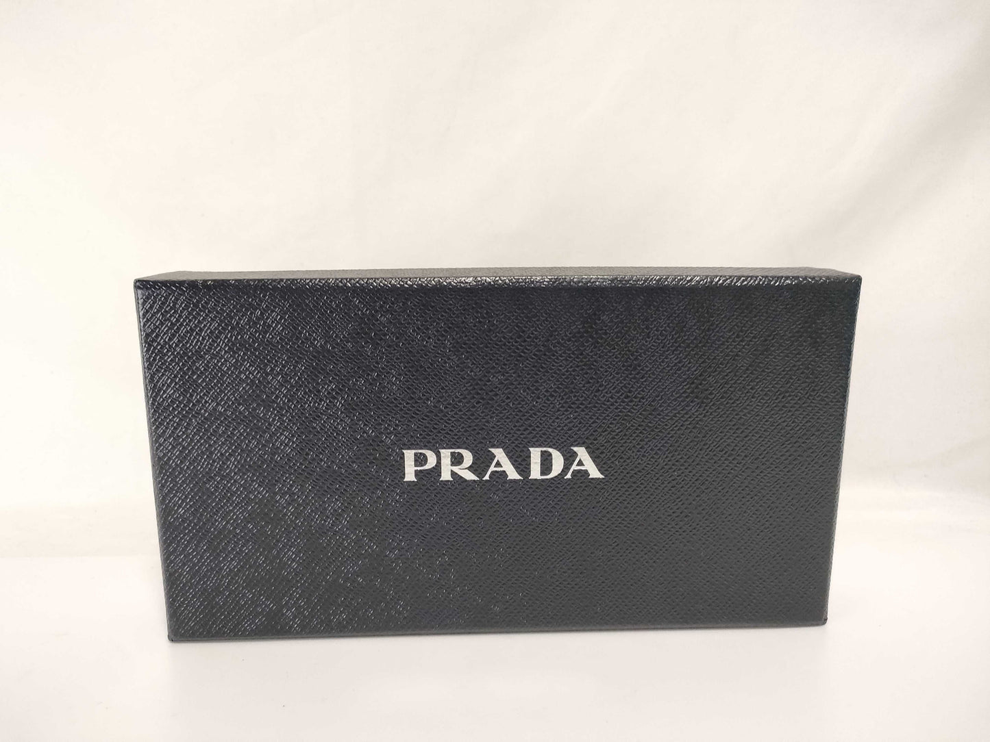 PRADA Saffiano Round Zippy Logo Wallet
