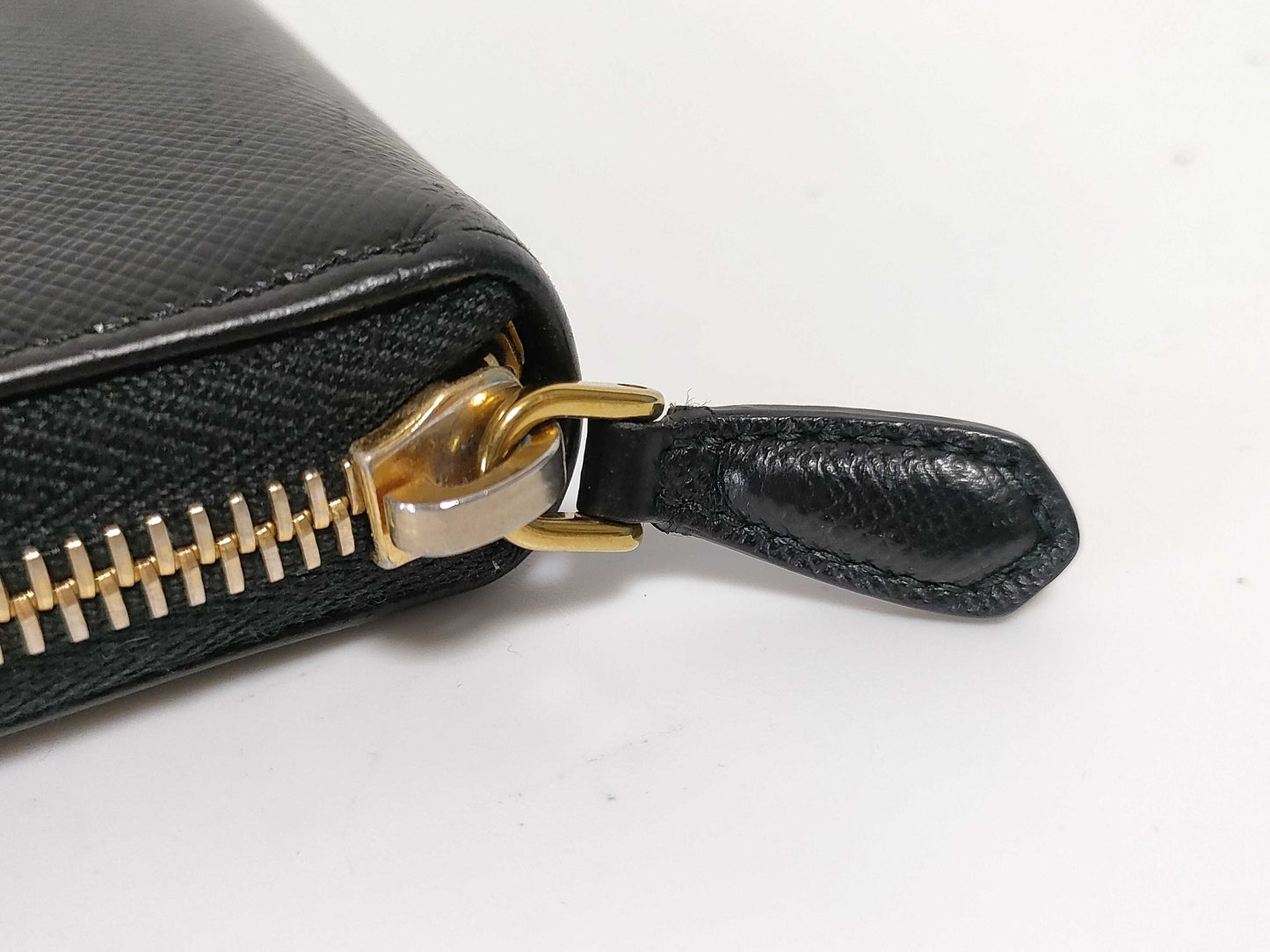 PRADA Saffiano Round Zippy Logo Wallet