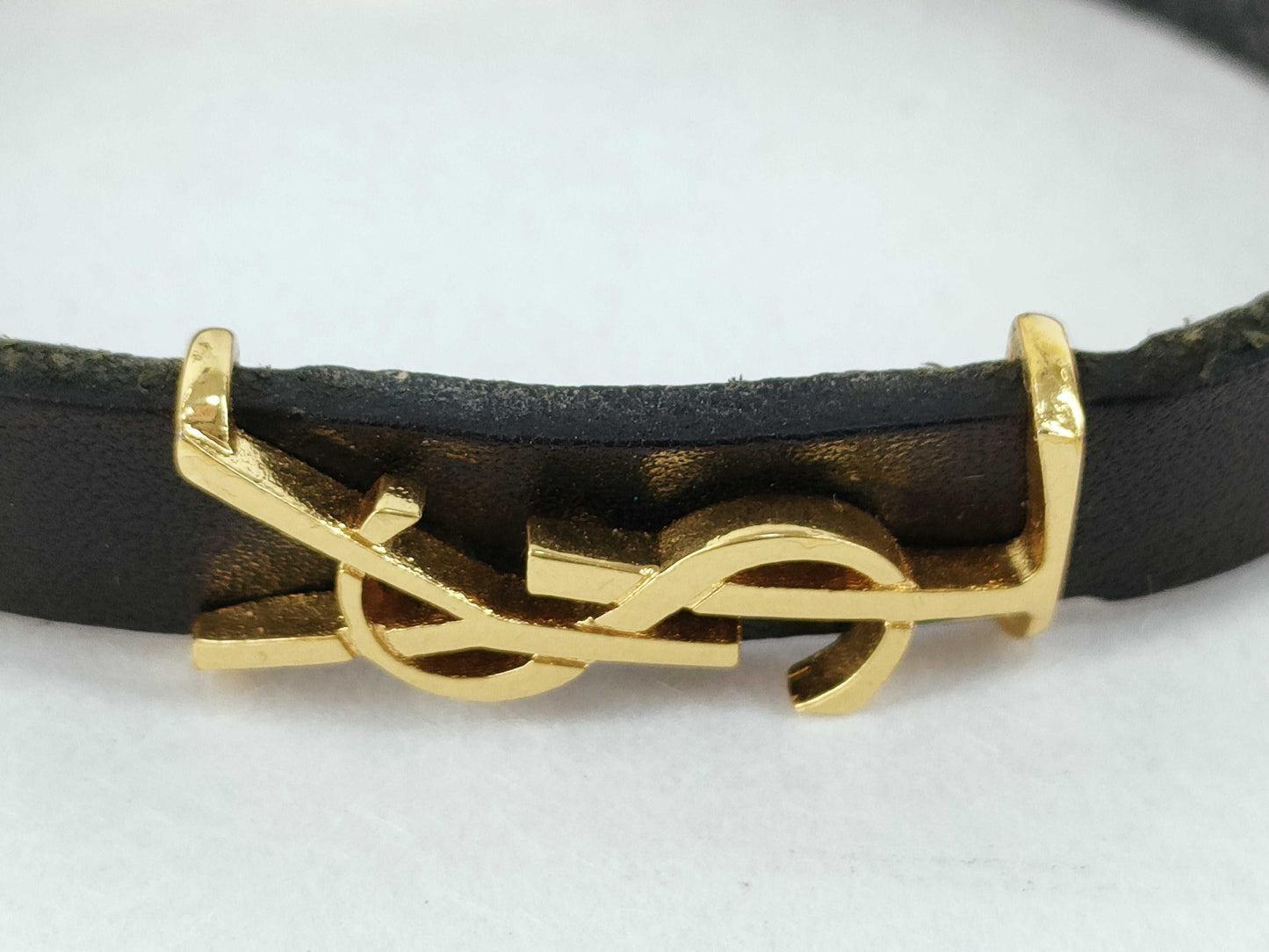 Yves Saint Laurent Cassandra Logo Bracelet in Leather, Black and Gold