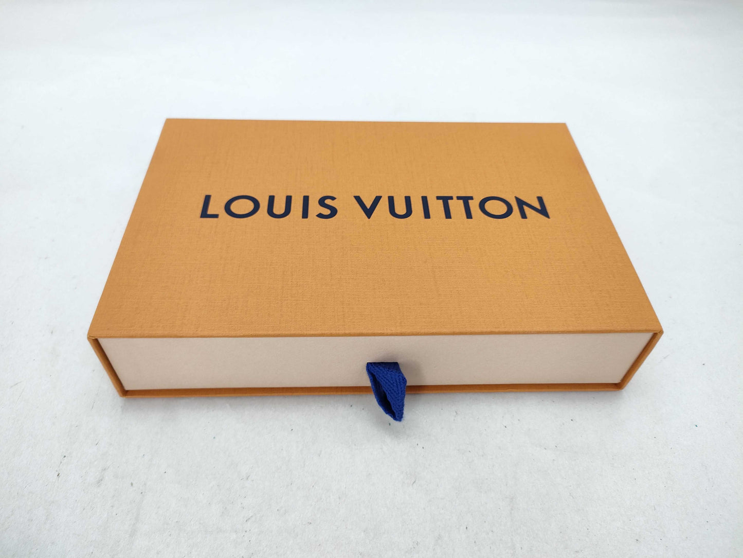 12 Louis Vuitton Empty Boxes, Wallets, etc.