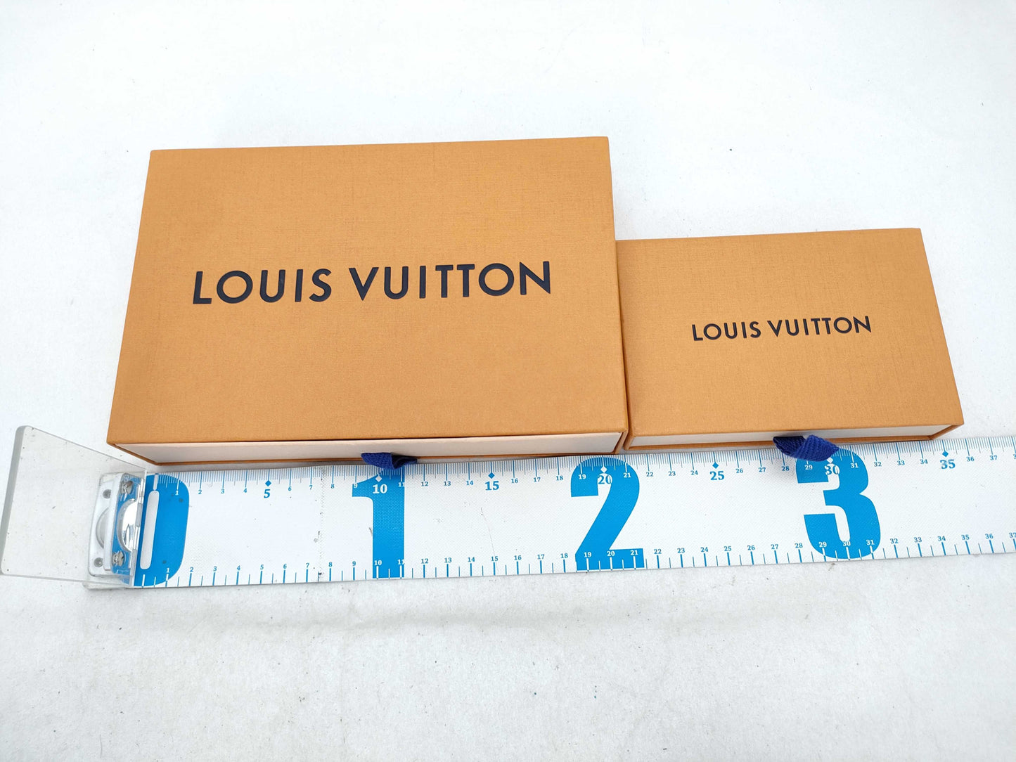 12 Louis Vuitton Empty Boxes, Wallets, etc.