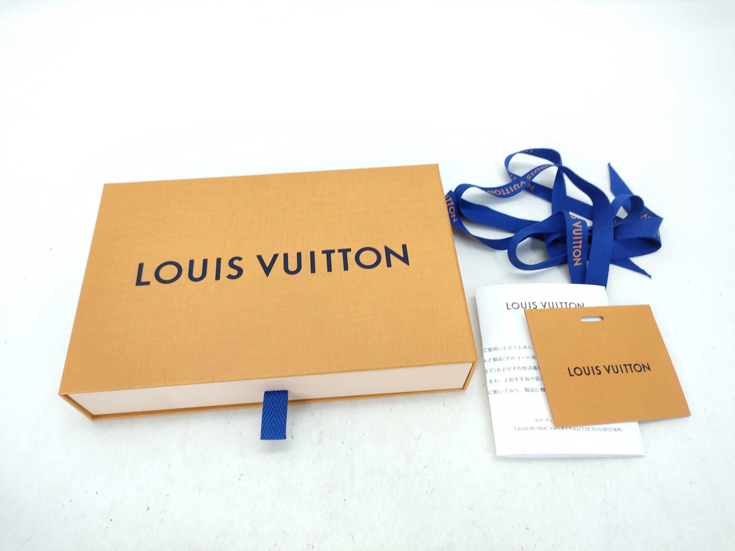 12 Louis Vuitton Empty Boxes, Wallets, etc.