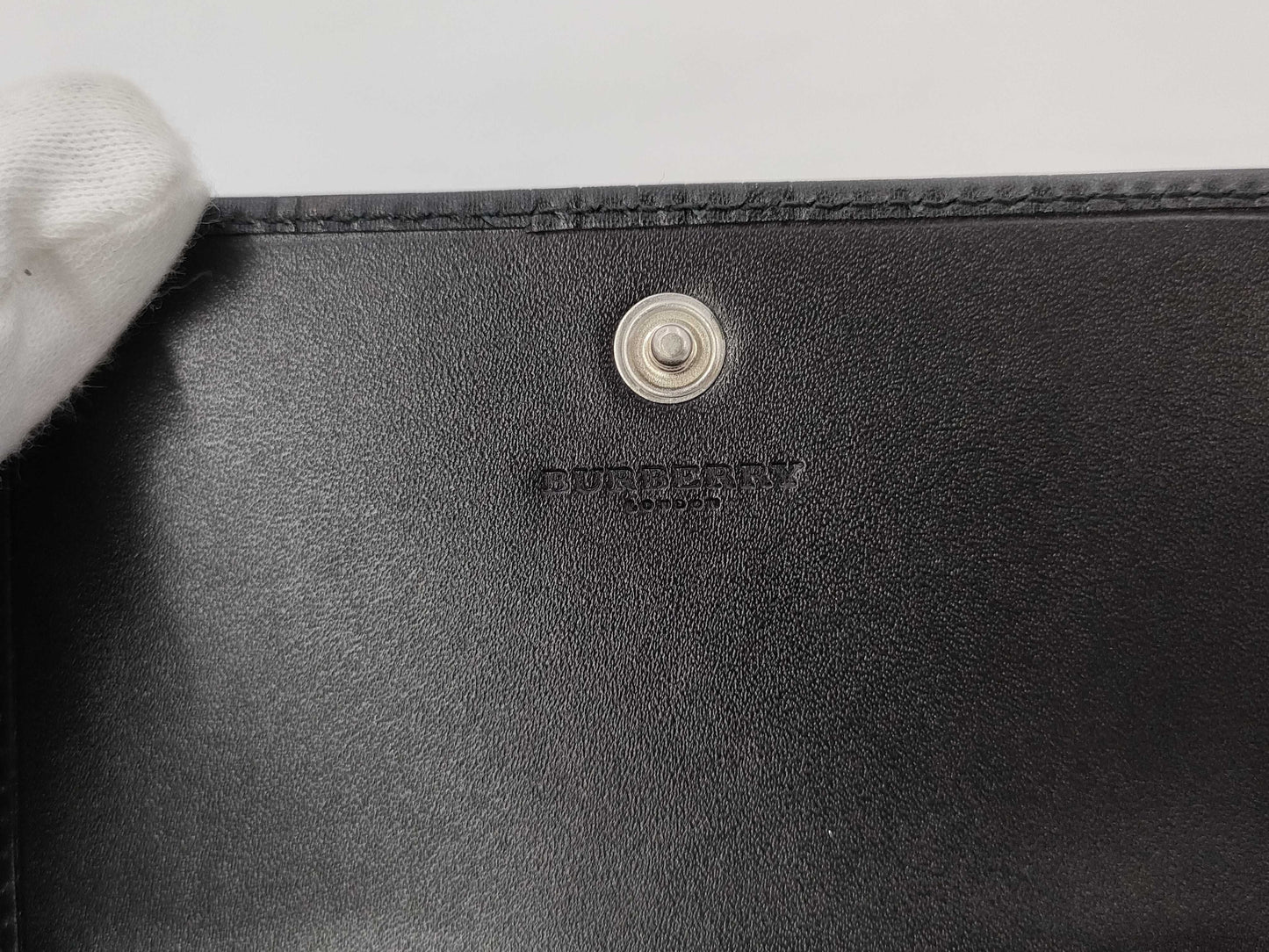 BURBERRY Burberry embossed check black leather wallet