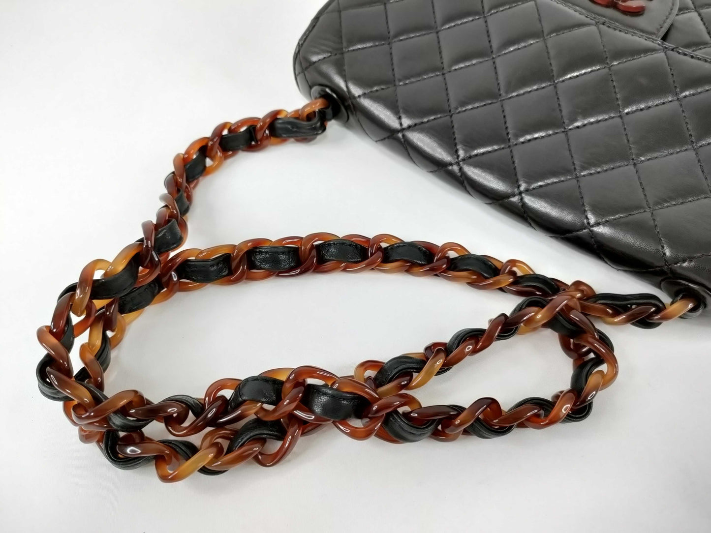 CHANEL Lambskin Tortoiseshell Plastic Chain Shoulder Bag in Black