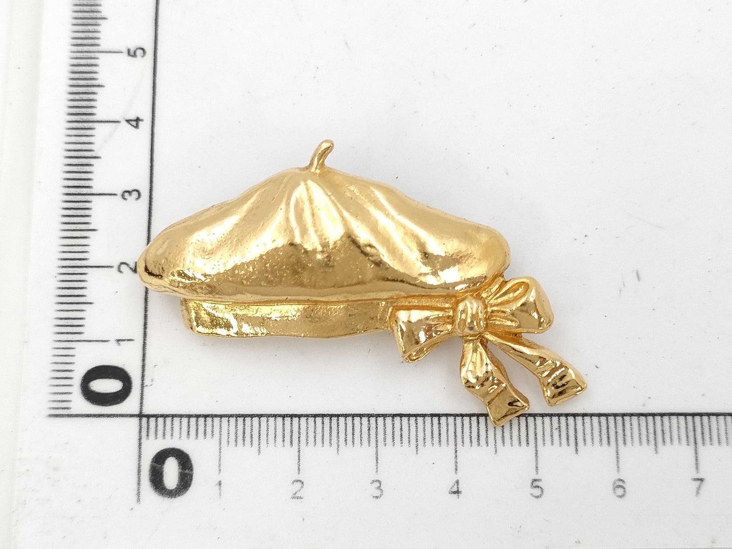 CHANEL beret brooch