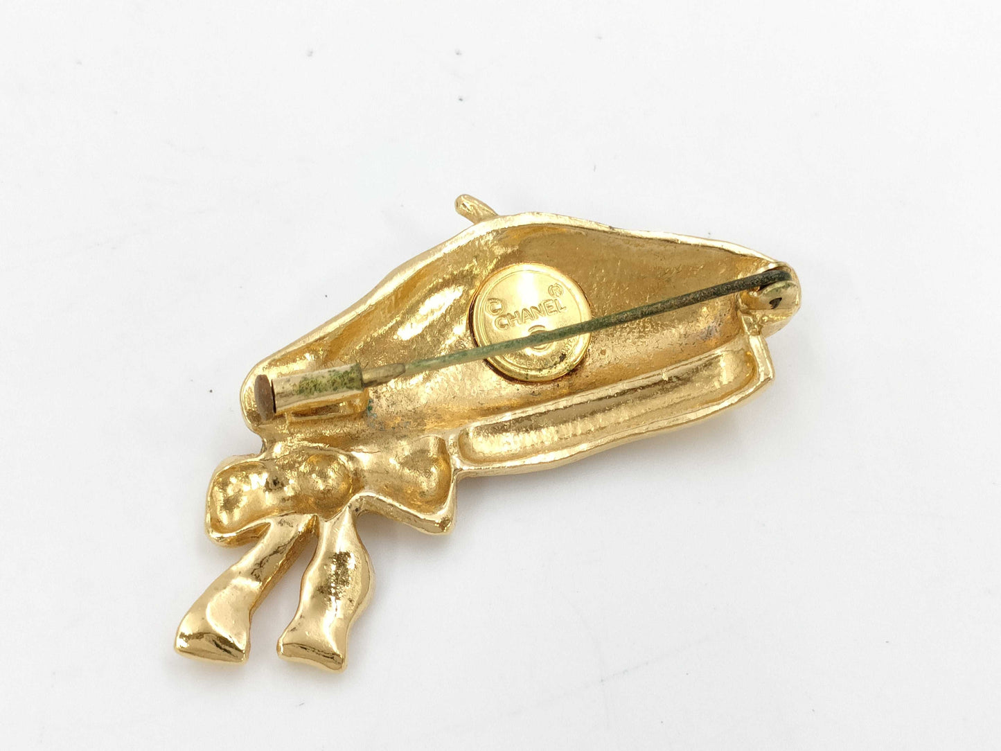 CHANEL beret brooch
