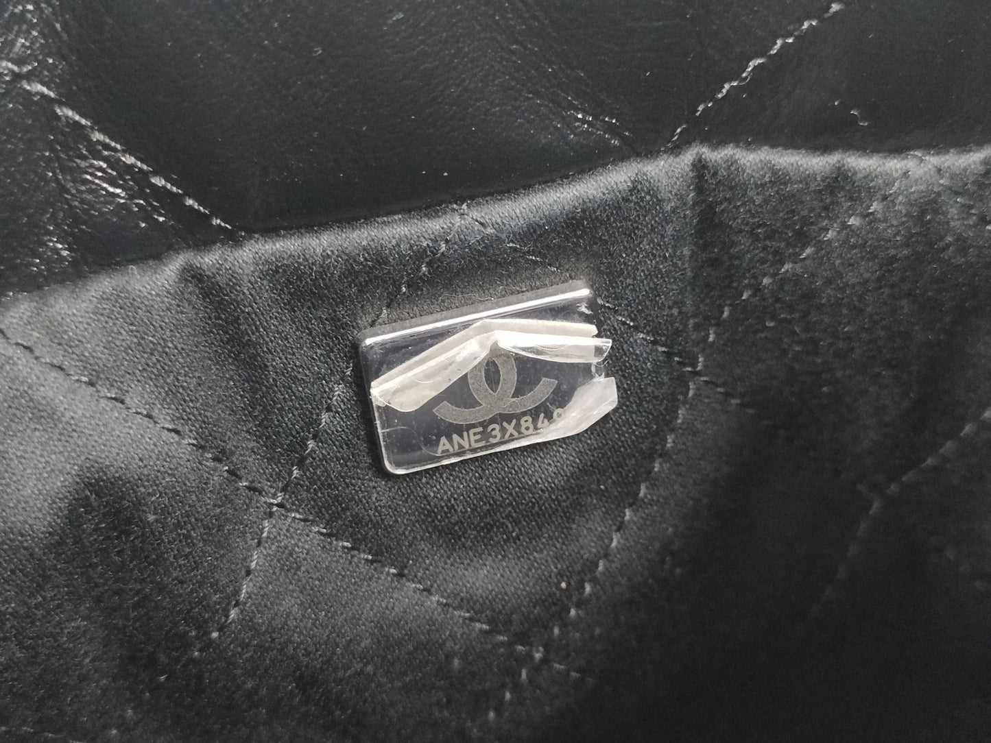 CHANEL Chanel 22 Mini Black Shoulder Bag with Silver Hardware and GP Serial Plate