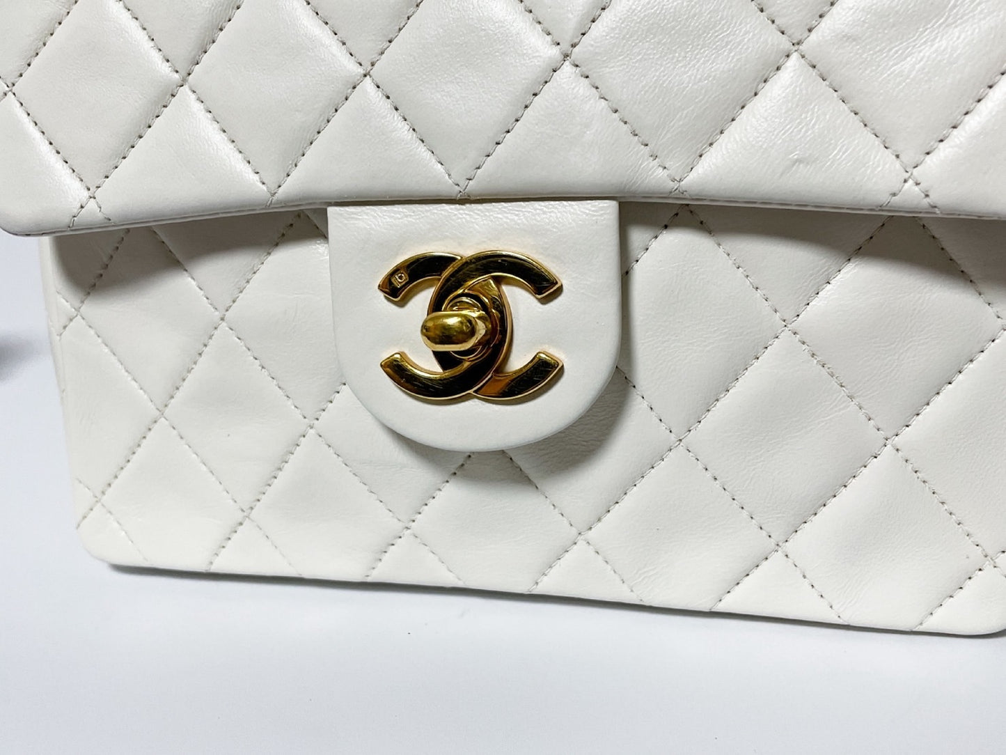 CHANEL Mini Matelasse White Lambskin Shoulder Bag with Seal
