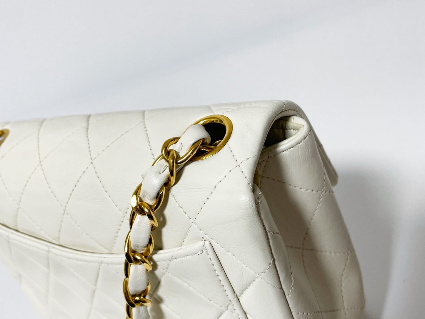 CHANEL Mini Matelasse White Lambskin Shoulder Bag with Seal