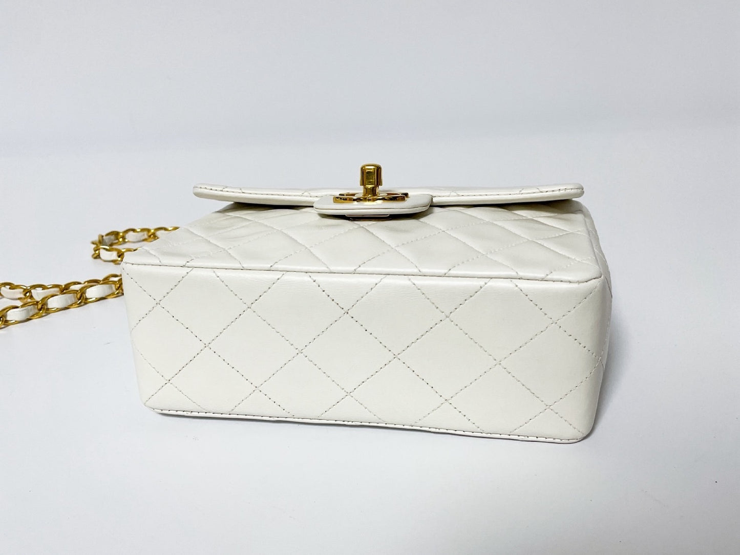 CHANEL Mini Matelasse White Lambskin Shoulder Bag with Seal