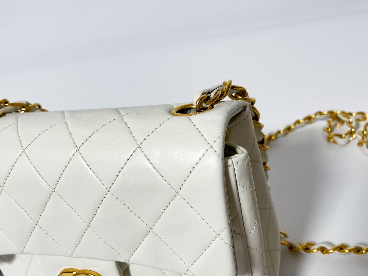 CHANEL Mini Matelasse White Lambskin Shoulder Bag with Seal