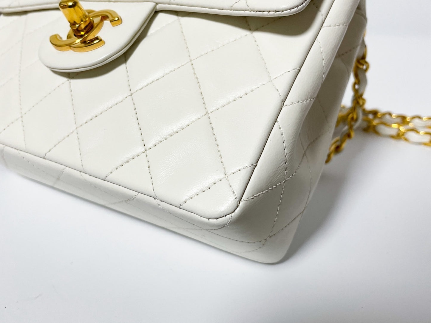 CHANEL Mini Matelasse White Lambskin Shoulder Bag with Seal