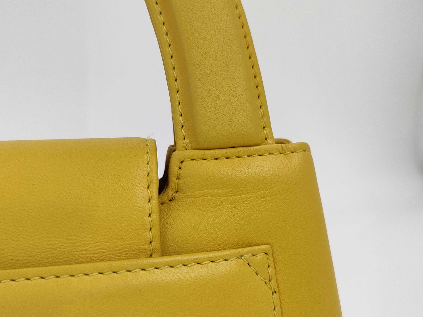 CHANEL Top Handle Lambskin Handbag with Turn Lock, Yellow