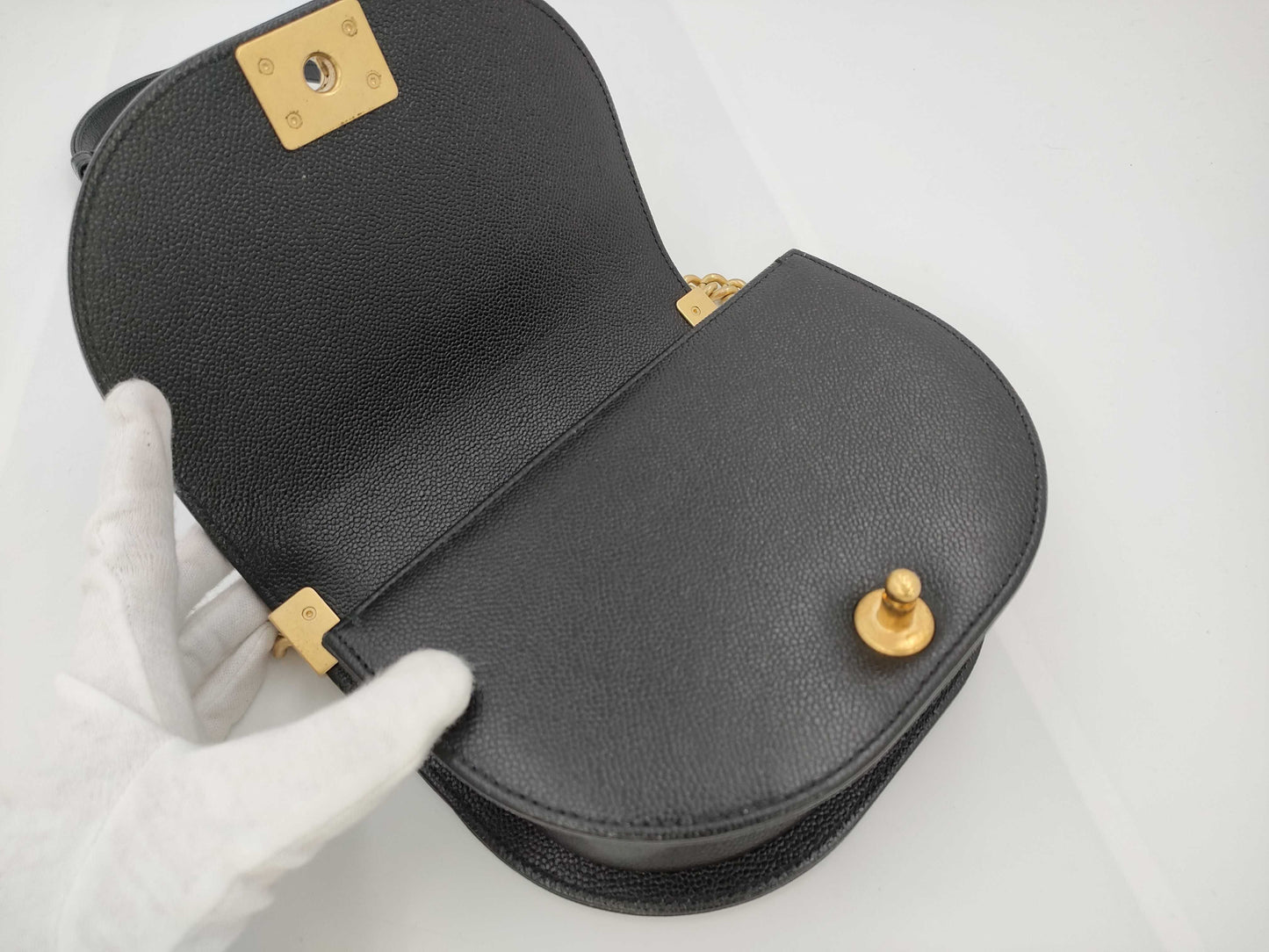 CHANEL Boy Chanel Round Caviar Leather Shoulder Bag with Gold Hardware and Chain Serial Number Plate in Black