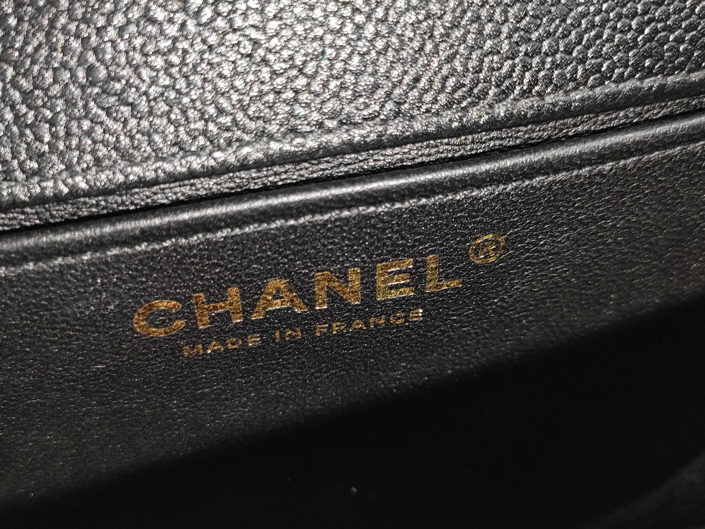 CHANEL Boy Chanel Round Caviar Leather Shoulder Bag with Gold Hardware and Chain Serial Number Plate in Black