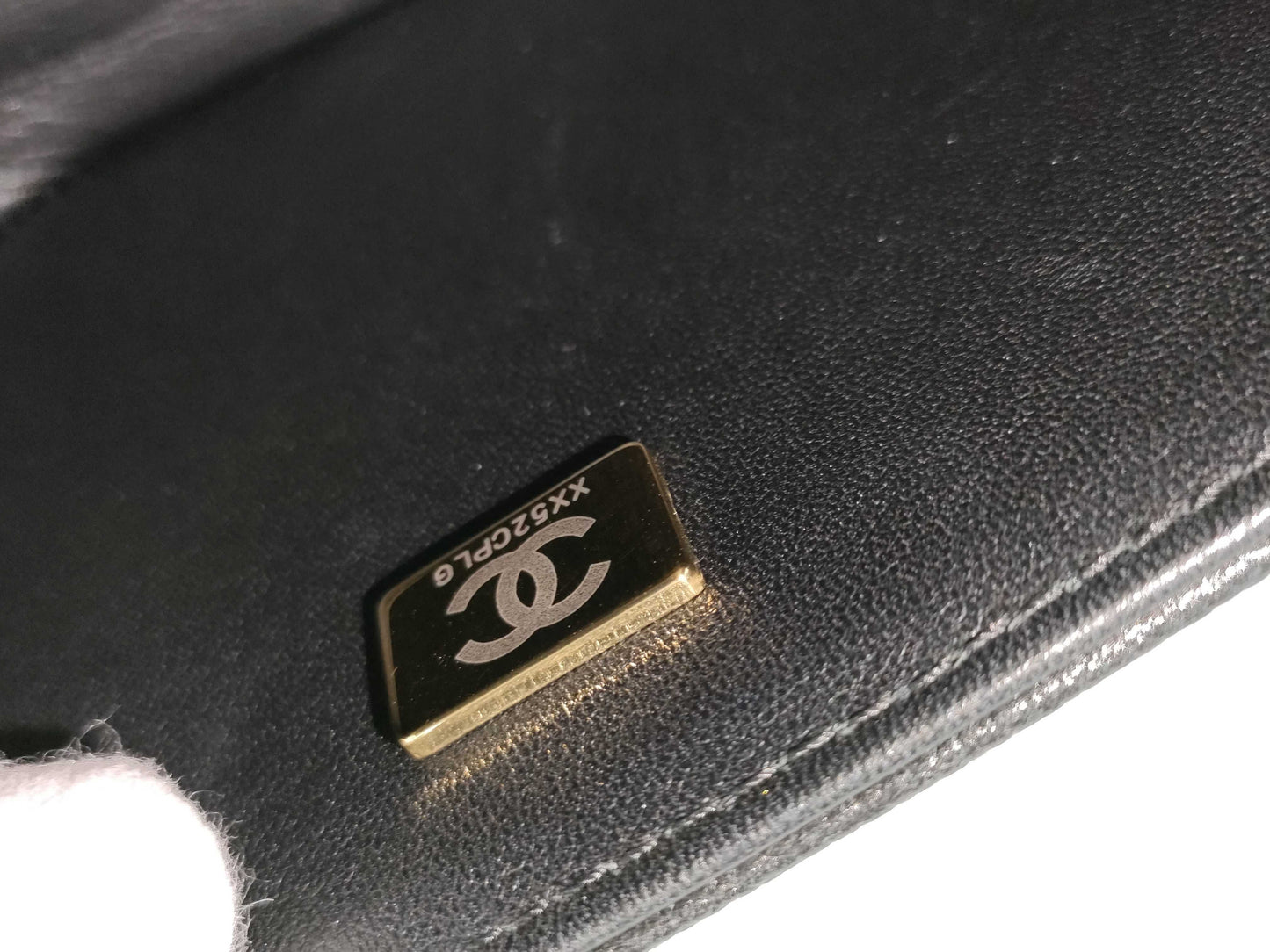 CHANEL Boy Chanel Round Caviar Leather Shoulder Bag with Gold Hardware and Chain Serial Number Plate in Black