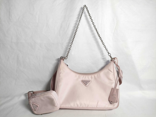 PRADA RE-Edition 2005 2-way shoulder bag with key ring, pink beige, silver hardware, nylon 103, slightly soiled.