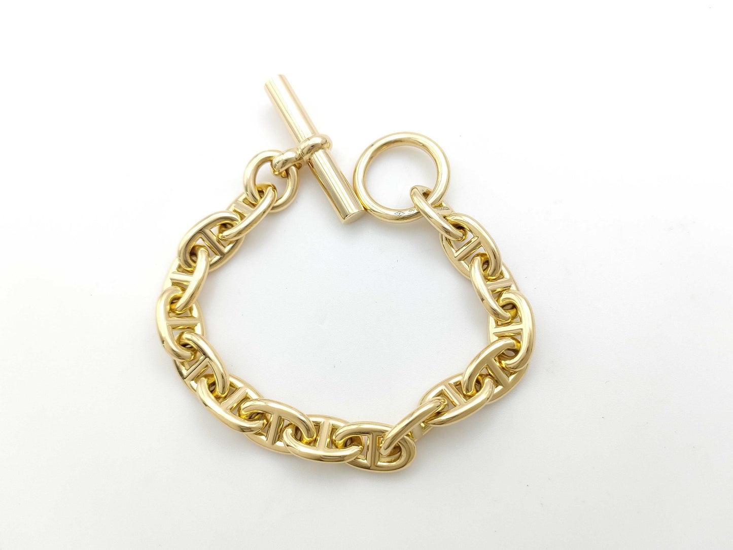 HERMES Chaine d'Ancre PM 16-link bracelet in YG Au750, 51.1g.