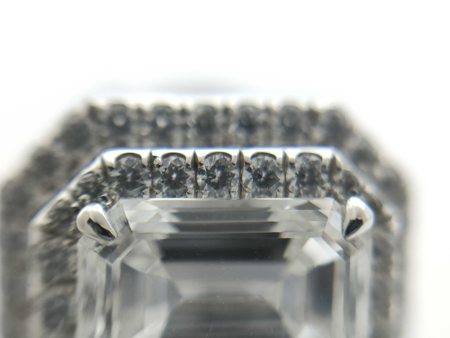 HARRY WINSTON Harry Winston PT950 Pin Brooch with 1.54ct Emerald Cut Diamond, D/VS1, and 3.6g Pavé Diamonds.